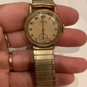 Lord Elgin Gold Filled Watch 10 kt. Bezel Stainless Steel Back.